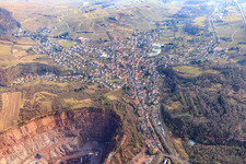Queichtal in winter from the west with quarry Albersweiler of the Basalt-Actien-Gesellschaft in Albersweiler in the state Rhineland-Palatinate, Germany