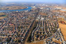 City view on the banks of the Rhine with railway line from the south in Gernsheim in the state Hesse, Germany