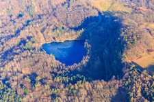 Quarry lake at Fischbachtal in the district Meßbach in Fischbachtal in the state Hesse, Germany from above