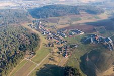 Village - view on the edge of agricultural fields and farmland in Kocherbach in the state Hesse, Germany