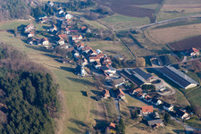 Aerial view of Village - view on the edge of agricultural fields and farmland in Kocherbach in the state Hesse, Germany