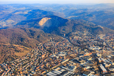 Aerial view of City view on the edge of the Odenwald between quarry and industrial area (Freudenberg GmbH) from the north in Weinheim in the state Baden-Wuerttemberg, Germany