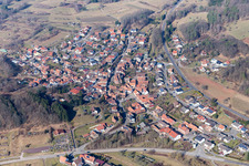Aerial view of Village - view on the edge of agricultural fields and farmland in Voelkersweiler in the state Rhineland-Palatinate, Germany