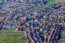 Main Street, St. Remigius and Lußhardthalle in Hambrücken in the state Baden-Wuerttemberg, Germany