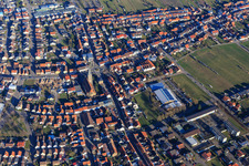Kirchstraße x Hauptstraße, St. Remigius and Lußhardthalle from the west in Hambrücken in the state Baden-Wuerttemberg, Germany