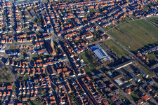 Aerial view of Kirchstraße x Hauptstraße, St. Remigius and Lußhardthalle from the west in Hambrücken in the state Baden-Wuerttemberg, Germany