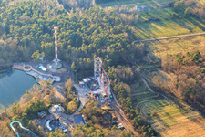 Lighthouse Tower and Superwirbel (roller coaster) in Holiday Park in Haßloch in the state Rhineland-Palatinate, Germany