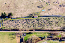 Grave rows on the grounds of the cemetery in Ettendorf in Grand Est, France from above