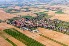 Village - view on the edge of agricultural fields and farmland in Melsheim in Grand Est, France