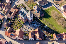 Aerial view of Protestantic Church building in the village of in Schwindratzheim in Grand Est, France