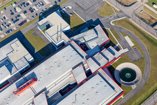 Oblique view of Building and production halls on the premises of SEW-USOCOME usine de Brumath in Bernolsheim in Grand Est, France