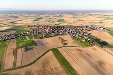 Village - view on the edge of agricultural fields and farmland in Oberlauterbach in Grand Est, France