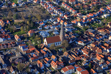 Catholic Church of St. Mary's Assumption with scaffolded tower in Herxheim bei Landau in the state Rhineland-Palatinate, Germany