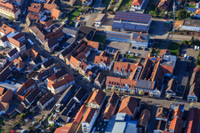 Upper Main Street with the town hall of Herxheim and the Herxheim Association and Municipal Utilities in Herxheim bei Landau in the state Rhineland-Palatinate, Germany