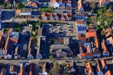 Upper Main Street with the town hall of Herxheim and the Herxheim Family Office in Herxheim bei Landau in the state Rhineland-Palatinate, Germany
