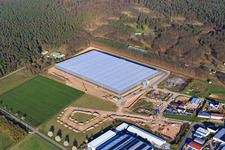 Oblique view of Waldstückerring industrial area with construction site of the logistics hall for Continental Reifen GmbH and FIEGE Logistik in Bellheim in the state Rhineland-Palatinate, Germany