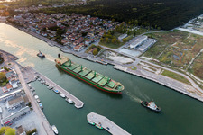 Cargo ships and bulk carriers towed to the Adriatic sea in Marina di Ravenna in Emilia-Romagna, Italy