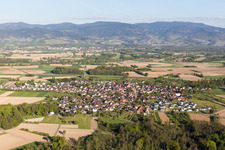 Village - view on the edge of agricultural fields and farmland in Unzhurst in the state Baden-Wurttemberg, Germany