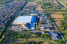Industrial area Industriestraße with Götz Maschinenbau GmbH & Co.KG and Logistik Schmitt (location PCC Ötigheim) in Ötigheim in the state Baden-Wuerttemberg, Germany