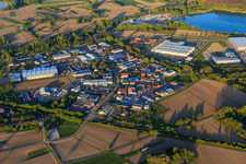 Industrial area Industriestraße from the southwest with OFTEC Oberflächentechnik GmbH & Co. KG and Faurecia Innenraum Systeme GmbH in Hagenbach in the state Rhineland-Palatinate, Germany