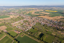 Village - view on the edge of agricultural fields and farmland in Steinfeld in the state Rhineland-Palatinate, Germany