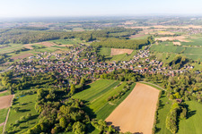 Village - view on the edge of agricultural fields and farmland in Lobsann in Grand Est, France