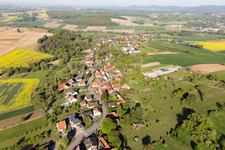 Aerial view of Village - view on the edge of agricultural fields and farmland in Gunstett in Grand Est, France
