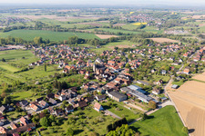 Aerial photograpy of Village - view on the edge of agricultural fields and farmland in Gunstett in Grand Est, France