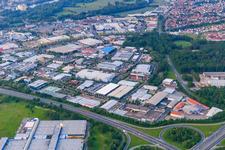 Aerial view of Hafen-Ost industrial area (Friedrich-Rätzer-Straße and Silbersteinstraße) in the evening with MediaMarkt Schweinfurt, Kunststofftechnik Ros GmbH & Co. KG and MAINCOR Rohrsysteme GmbH & Co. KG in Schweinfurt in the state Bavaria, Germany