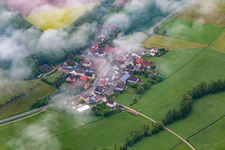 Aerial view of Place under clouds in the district Zettmannsdorf in Schönbrunn im Steigerwald in the state Bavaria, Germany