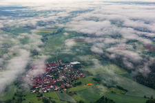 Village under clouds in the district Ampferbach in Burgebrach in the state Bavaria, Germany