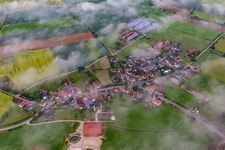 Place under clouds in the district Dietendorf in Burgebrach in the state Bavaria, Germany