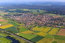 View of the town from the southeast beyond the A70 and railway line in Oberhaid in the state Bavaria, Germany