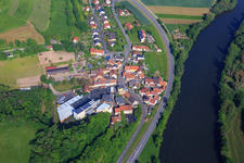 River banks of the Main from the southeast with Eschenbacher Privatbrauerei GmbH Haus Wagner in the district Eschenbach in Eltmann in the state Bavaria, Germany