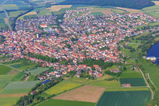 View of the town south of the Main from the east with Dreiberg School Knetzgau and AWO Senior Center Knetzgau in Knetzgau in the state Bavaria, Germany