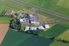 Tower and hangar at the commercial airfield Haßfurt-Haßberge GmbH in the district Kleinaugsfeld in Haßfurt in the state Bavaria, Germany
