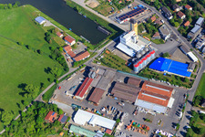 Aerial view of Port industrial estate with XXL-Automotive GmbH & Co. KG, BayWa AG Building Materials Haßfurt and Waterways and Shipping Authority Main - Outer District Haßfurt in Haßfurt in the state Bavaria, Germany