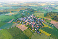 Village - view on the edge of agricultural fields and farmland in Wasserlosen in the state Bavaria, Germany