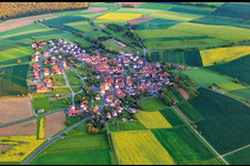 Village - view from the north with St. Cyriakus Church in the district Schwemmelsbach in Wasserlosen in the state Bavaria, Germany