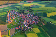 Aerial view of Village - view from the north with St. Cyriakus Church in the district Schwemmelsbach in Wasserlosen in the state Bavaria, Germany