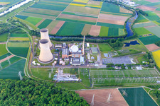 Aerial view of Overview of the nuclear power plant Grafenrheinfeld of Preussenelektra GmbH on the banks of the Main at sunset in Grafenrheinfeld in the state Bavaria, Germany