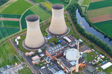 Aerial photograpy of Cooling towers and reactor dome of the nuclear power plant Grafenrheinfeld of Preussenelektra GmbH at sunset in Grafenrheinfeld in the state Bavaria, Germany