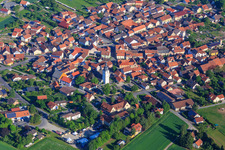 Aerial view of Village view from the east with St. Margareta Church in Großbardorf in the state Bavaria, Germany