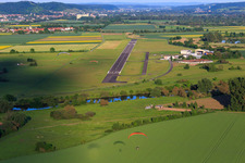 Aerial view of Runway of the commercial airfield Haßfurt-Haßberge GmbH in the district Mariaburghausen in Haßfurt in the state Bavaria, Germany