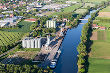 Piers with ship loading crane at the Mainlaende in Zeil am Main in the state Bavaria, Germany