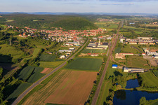 View of the town from the west with the Straßenäcker industrial estate and HENFLING wood industry in Ebelsbach in the state Bavaria, Germany