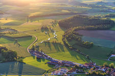 Meandering, serpentine curve of a stream - river Baunach in the district Frickendorf in Ebern in the state Bavaria, Germany