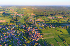 Village overview with Church of St. James the Elder and Castle Burgwindheim in Burgwindheim in the state Bavaria, Germany