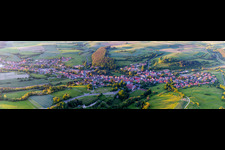 Village - view on the edge of agricultural fields and farmland in Trossenfurt in the state Bavaria, Germany