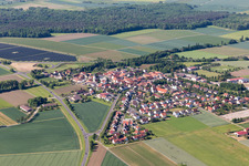Village - view on the edge of agricultural fields and farmland in Alitzheim in the state Bavaria, Germany